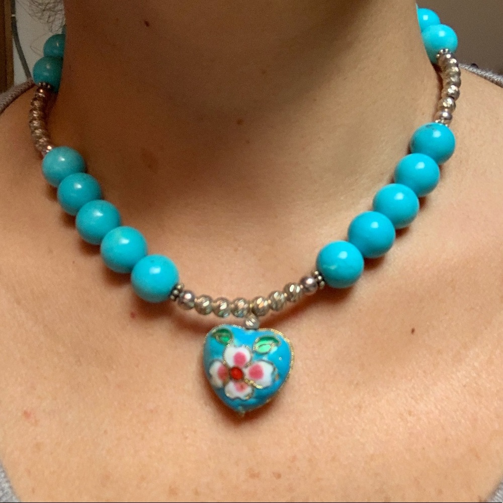 Set of necklace, earrings and bracelet